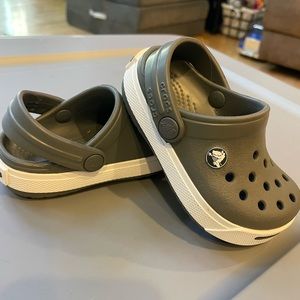Crocs baby size 4/5. Never worn. Gray and white.